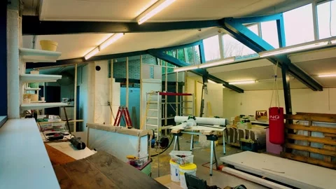 Busy construction workshop with tools and materials during renovation project Stock Footage 333813577