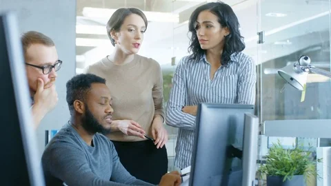 In the Busy Corporate Office Team of Diverse Young Creative People Work Stock Footage 84382453