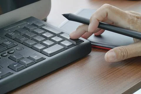 Busy in creative task use digital graphic tablet and drawing Stock Photos