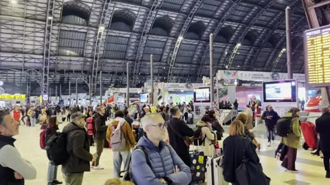 Busy Crowd Watching Train Timetable Board in Milan Central Station Travel Stock Footage 333496566