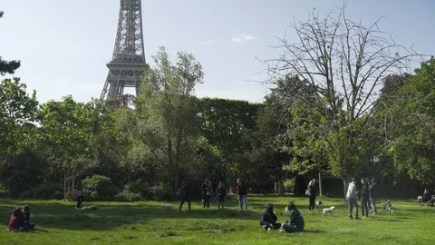 Busy /crowded park near Eiffel tower after coronavirus quarantine 4K Stock Footage 130145578