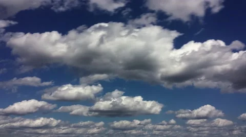 Busy cumulus cloud layers rolling left to right (2160p 29.97) Stock-Footage 68402782