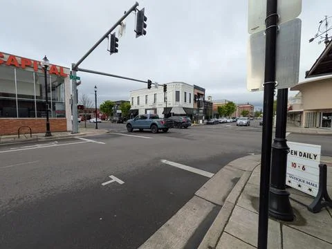 Busy downtown intersection featuring historic buildings Stock Photos