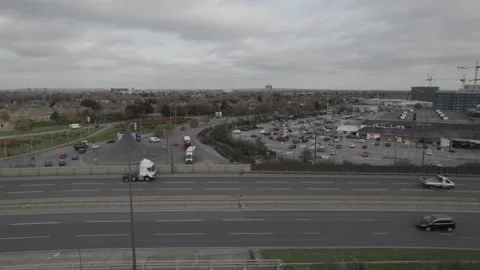 Busy elevated multilane highway and surrounding roundabout Stock Footage 167901666