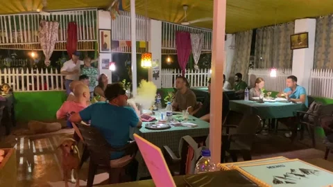 An Busy Evening Restaurant Beach Shack In Morjim North Goa INDIA. Vidéo 221995685