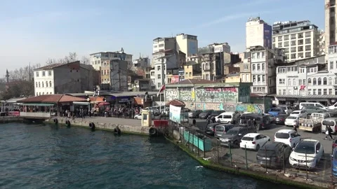 Busy ferry dock parking and street life in Karakoy 2 動画素材 343101082