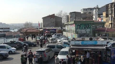 Busy ferry dock parking and street life in Karakoy Vídeo Stock 343101090
