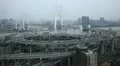 Busy Freeway Aerial View Shanghai Skyline Nanpu Bridge Interchange Huangpu River HD Footage