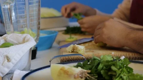 Busy hands preparing delicious salsa verde Stock-Footage 124664493