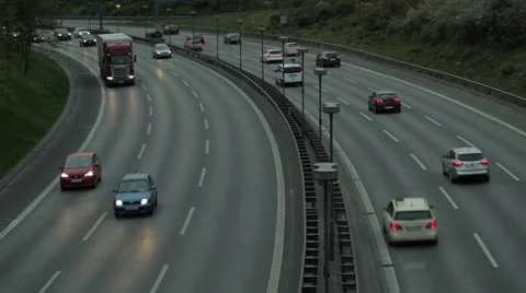 Busy highway at dusk, NTSC Stock Footage 49888561