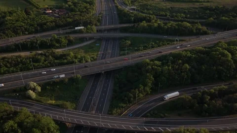 Busy Highway Interchange From Above During Golden Hour Vidéo 334948299