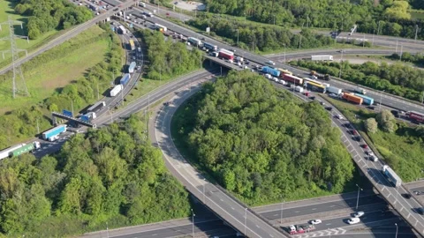 Busy Highway Interchange With Vehicles Stuck in Heavy Traffic Stock Footage 335292555