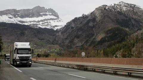 Busy highway with mountain view Stock Footage 75442956