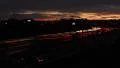 Busy Highway with Stadium in background HD Footage