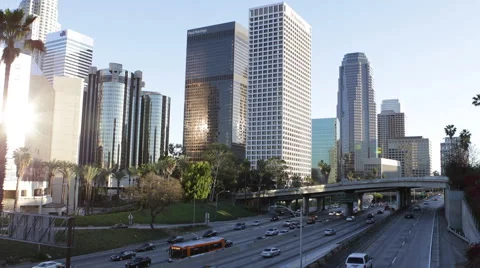 Busy Highway US Freeway Los Angeles Downtown Skyline Corporate Skyscraper Sunset Stock Footage 43924196