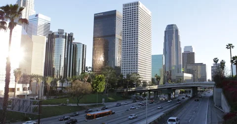 Busy Highway US Freeway Los Angeles Downtown Skyline Corporate Skyscraper Sunset Stock Footage 44399367