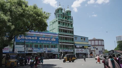 Busy Indian Town Street with Green Mosque Tower and Auto Rickshaws Stock Footage 339858853