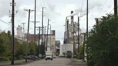 Busy Industrial Mill Complex Outgoing Delivery Traffic Stock Footage 10995584