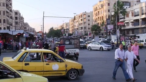A busy intersection in Aleppo, Syria Stock Footage