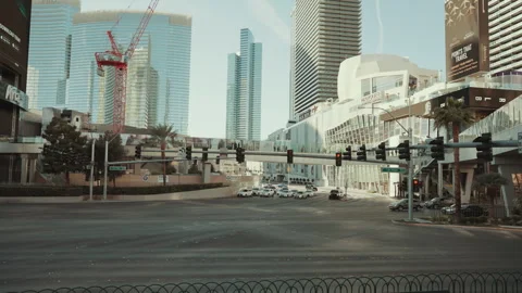 Busy intersection and high rise towers on the Las Vegas Strip Stock Footage 347833647