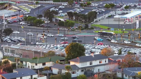 Busy intersection and parking lot in Panmure, Auckland, New Zealand Stock-Footage 338134110
