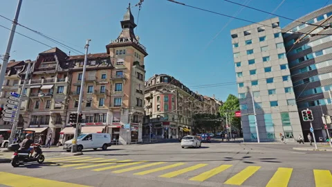 Busy Intersection and Rolex Building in Flon District, Lausanne, Switzerland Stock Footage 320070499