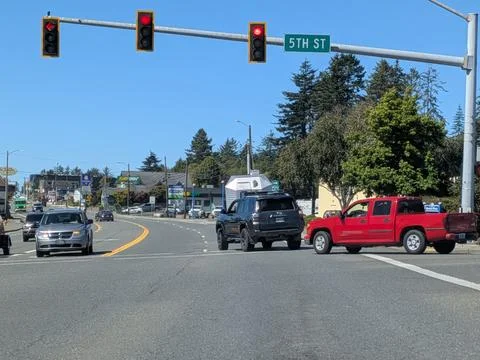 Busy intersection in Brookings, Oregon, featuring a 5th Street sign Stock Photos