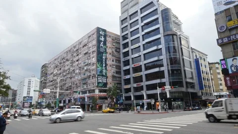 Busy intersection in central Taipei Stock Footage 72707731