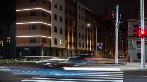 Busy intersection in city of Riga Latvia, timelapse of traffic at night Stock Footage 259212523