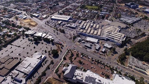 Busy intersection commercial district 4k aerial footage Stock Footage 106057655