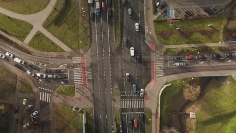 Busy intersection, drone ascending in spring Stock Footage 317832566