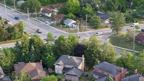 Busy Intersection Hidden by Trees in Barrie Ontario Hyperlapse Video stock 315541224