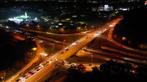 A busy intersection with a lot of traffic. Видео 318268168