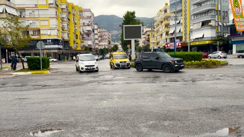 A busy intersection in a resort town on the southern coast of Turkey. Stock Footage 166922833
