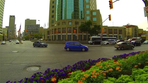 Busy Intersection Traffic Cars Winnipeg MB Canada Time-Lapse - Panning Left Stock Footage