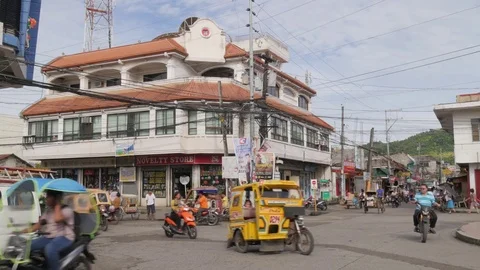 Busy intersection with traffic,Catbalogan,Samar,Philippines Stock Footage 84579183