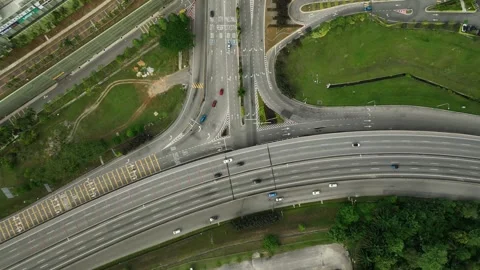 Busy intersection in urban area showing multiple roads and traffic patterns Stock Footage 311987381
