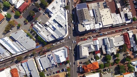 Busy intersection urban scene birds eye view aerial footage Stock Footage 107899653