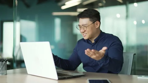 Busy IT programmer with glasses feels annoyed has problem with laptop computer  Stock Footage 225746708