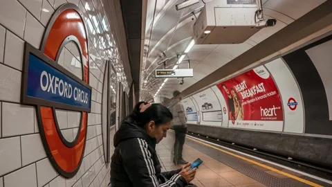 Busy London underground subway Oxford Circus train station time-lapse Stock Footage