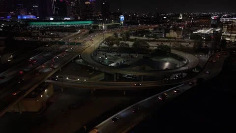 Busy Los Angeles Freeway Interchange Near Convention Center at Night Stock Footage 345702360