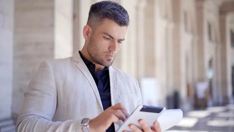 Busy man checking data using up-to-date tablet. Business conception Video stock 109181121