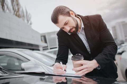 Busy man is in a hurry, he does not have time, he is going to talk on the pho Stock Photos