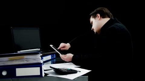 Busy man is working in his office Stock Footage