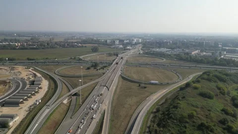 Busy Milan road interchange drone aerial video Stock Footage 319389618