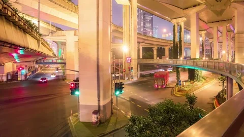 Busy modern highway intersection in Shanghai, China, at night. Stock Footage 82343382