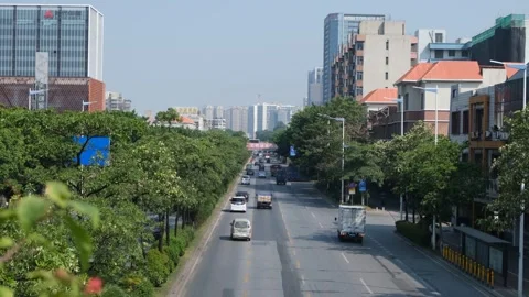 A busy, multi-lane roadway with various vehicles in Foshan, Guangdong, China Vídeos de archivo 291592913