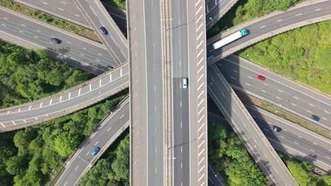 Busy Multi-Level Highway Interchange With Moving Vehicles Stock Footage 336953557