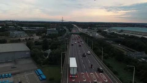 Busy multilane highway after sunset, vehicles braking to traffic jam Stock Footage 161129033