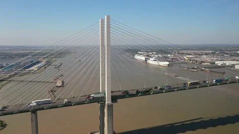 Busy multilane highway on cable-stayed bridge over river Stock-Footage 161131861